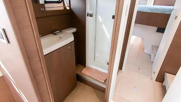 Joy Yacht Photos Pics Interior of 2021 Bali 5.4 yacht featuring bathroom and cabin with modern amenities.