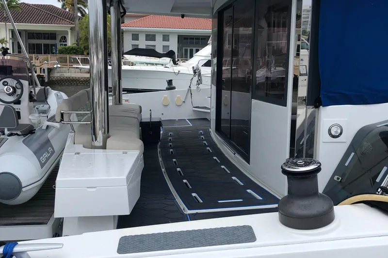 Joy Yacht Photos Pics Bali 5.4 yacht deck, 2021 model, featuring modern seating and sleek design.