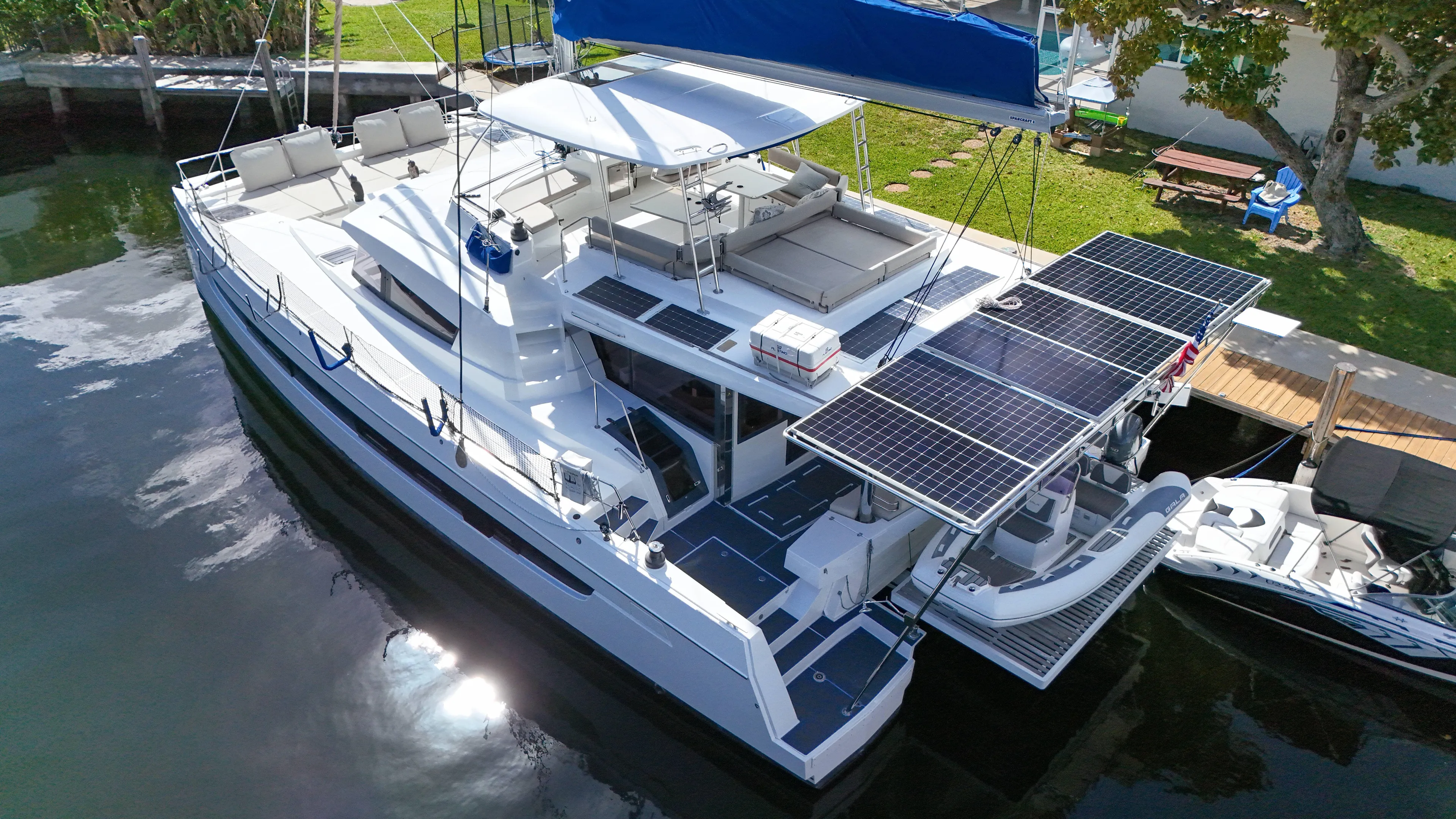 Joy Yacht Photos Pics Luxury Bali 5.4 catamaran with solar panels docked, 2021 model.