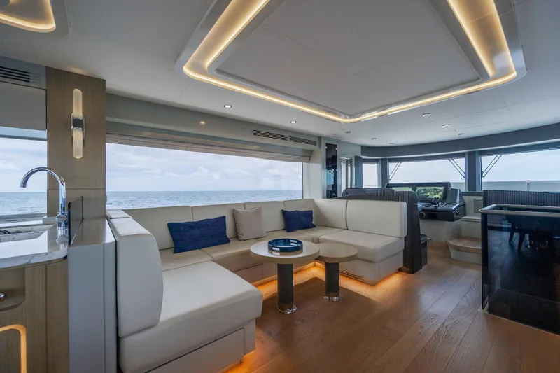 My Lady Y Yacht Photos Pics Luxurious interior of 2023 Sirena 68 yacht with modern seating and ocean view.
