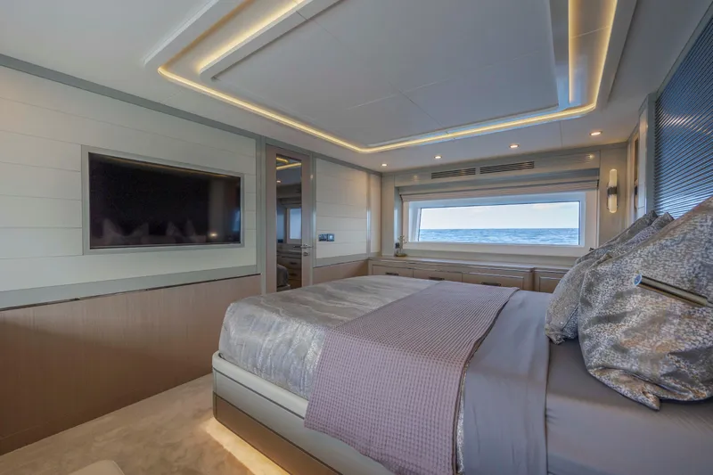 My Lady Y Yacht Photos Pics Luxurious bedroom interior of 2023 Sirena 68 yacht with ocean view and modern design.