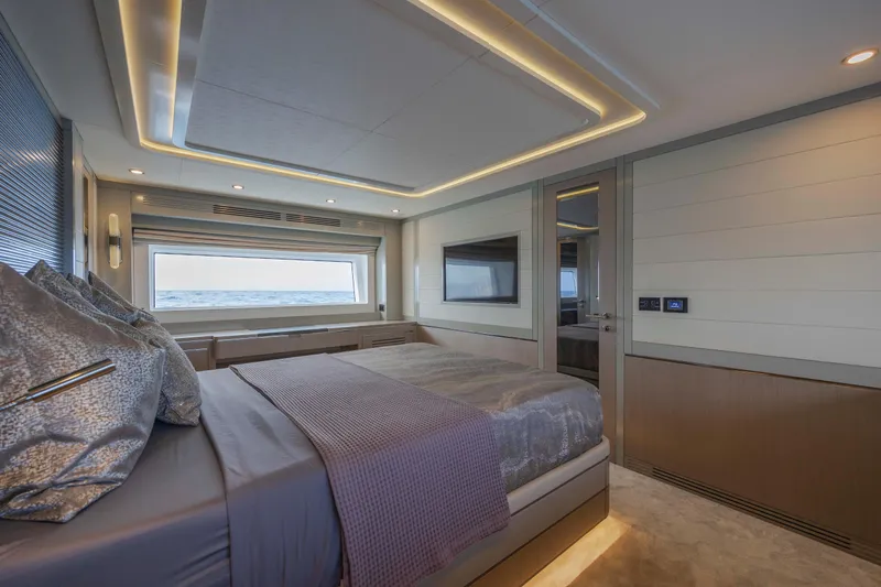 My Lady Y Yacht Photos Pics Luxurious bedroom interior of 2023 Sirena 68 yacht with modern design and ocean view.