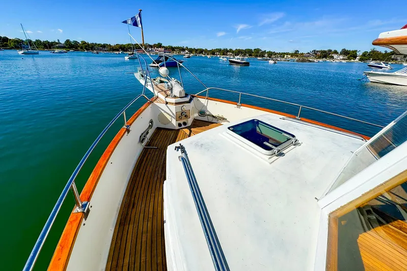 4796tw Yacht Photos Pics 1988 Grand Banks 42 Classic yacht on serene water, showcasing deck and scenic view.