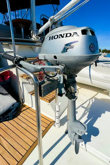 4796tw Yacht Photos Pics Honda outboard motor on 1988 Grand Banks 42 Classic yacht deck.