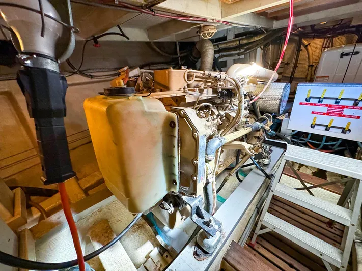 4796tw Yacht Photos Pics Engine room of 1988 Grand Banks 42 Classic yacht, showcasing mechanical components and wiring.
