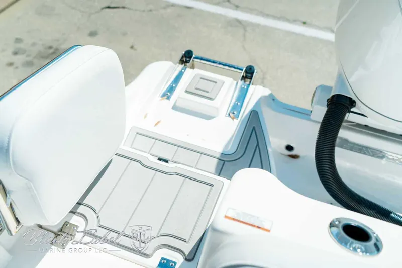 Black Label Marine Yacht Photos Pics 2025 Sea Fox 268 Commander boat deck with seating and storage compartments.