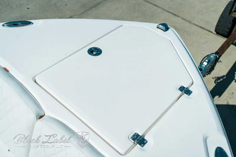 Black Label Marine Yacht Photos Pics 2025 Sea Fox 268 Commander boat deck with storage hatch and sleek design.