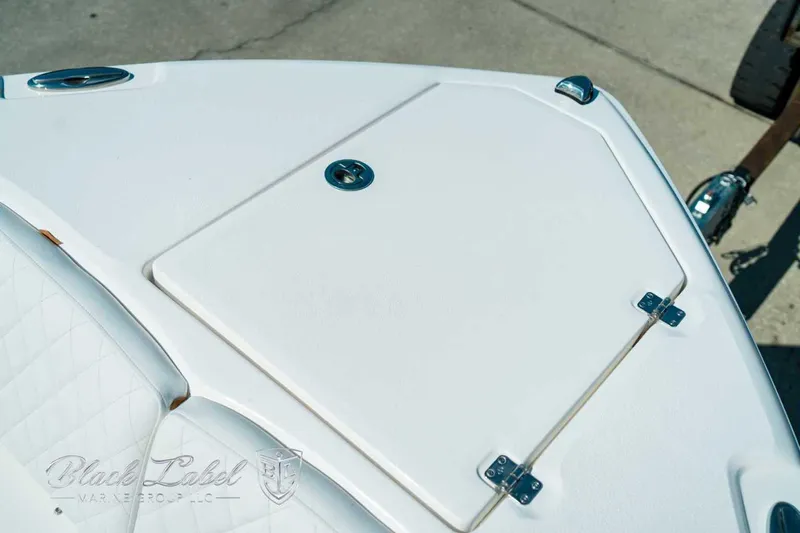 Black Label Marine Yacht Photos Pics 2025 Sea Fox 268 Commander boat deck with storage compartment and sleek design.