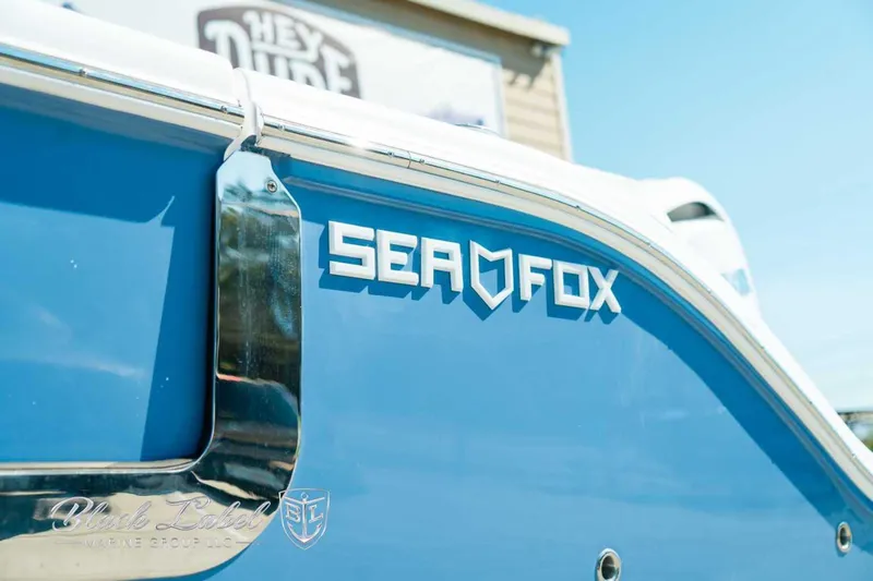 Black Label Marine Yacht Photos Pics 2025 Sea Fox 268 Commander boat with blue hull and chrome details.