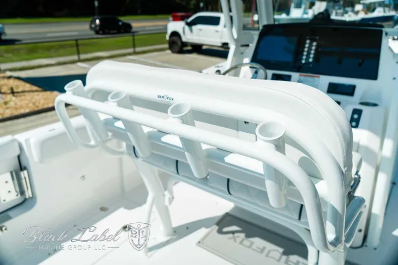 Black Label Marine Yacht Photos Pics 2025 Sea Fox 268 Commander boat interior with rod holders and control panel.