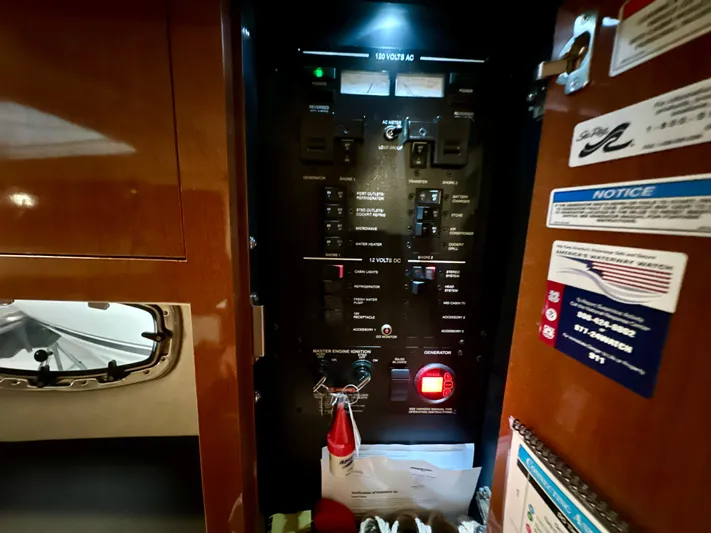  Yacht Photos Pics Electrical panel inside a 2010 Sea Ray 310 Sundancer boat cabin.