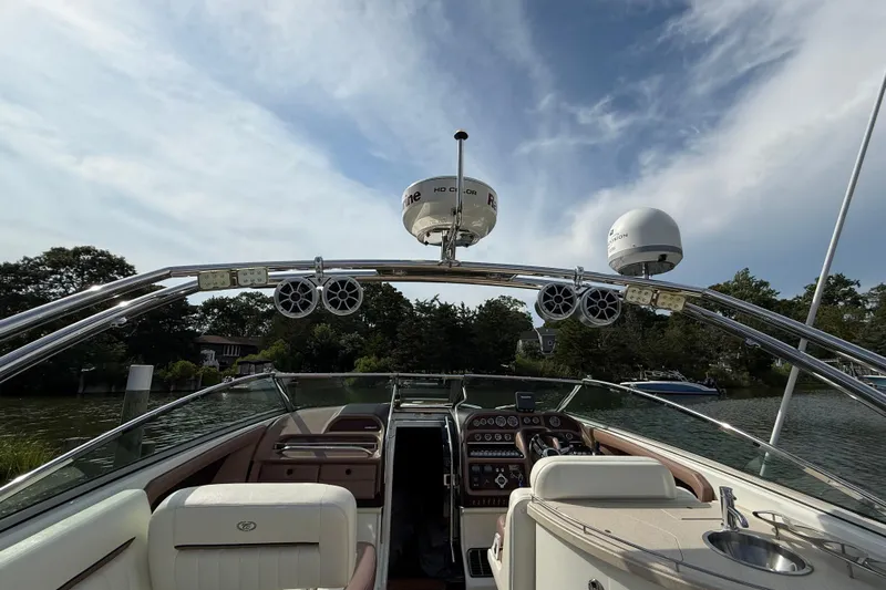  Yacht Photos Pics 2013 Cobalt 323 boat interior with advanced navigation equipment and luxurious seating.