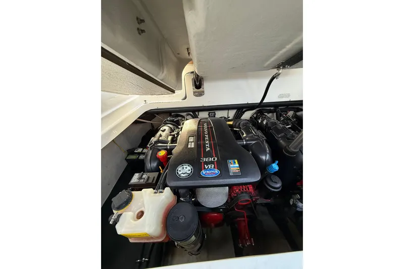  Yacht Photos Pics Engine compartment of a 2013 Cobalt 323 boat featuring a Volvo Penta V8 engine.