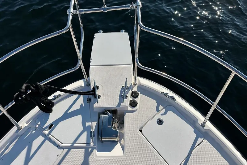 Buoy Boys Yacht Photos Pics Bow of 2025 Ranger Tugs R-29 CB boat with railing and anchor system.