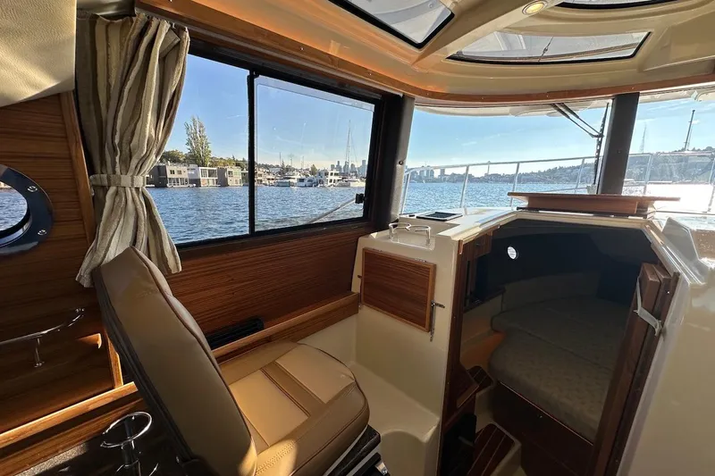 Buoy Boys Yacht Photos Pics Interior of 2025 Ranger Tugs R-29 CB boat with scenic water view.