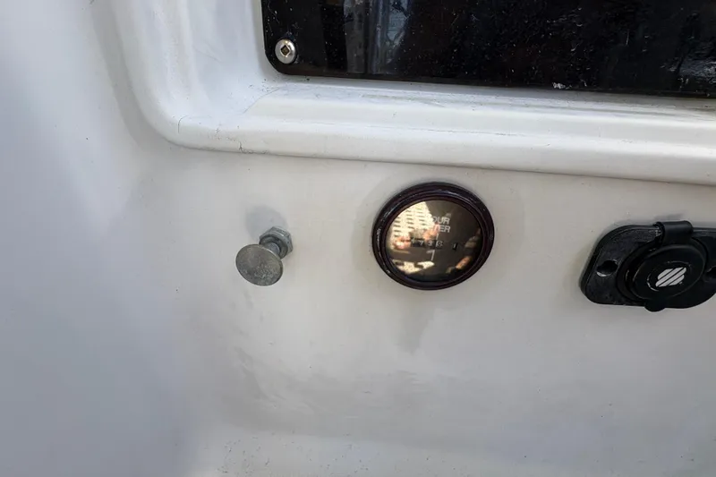 Skye Yacht Photos Pics Close-up of Beneteau Oceanis 500 yacht dashboard, featuring a gauge and controls, 1990 model.