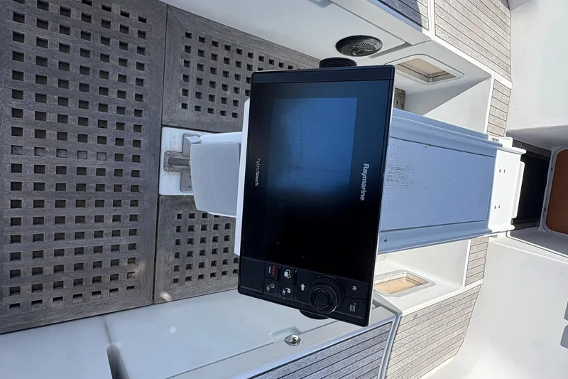 Skye Yacht Photos Pics Cockpit of 1990 Beneteau Oceanis 500 with Raymarine navigation system.