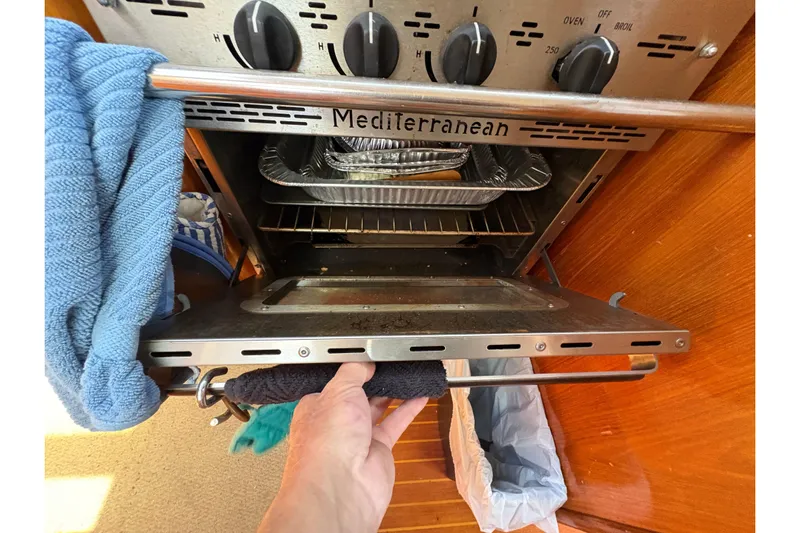 Skye Yacht Photos Pics Oven in Beneteau Oceanis 500 yacht kitchen, showing open door and controls.