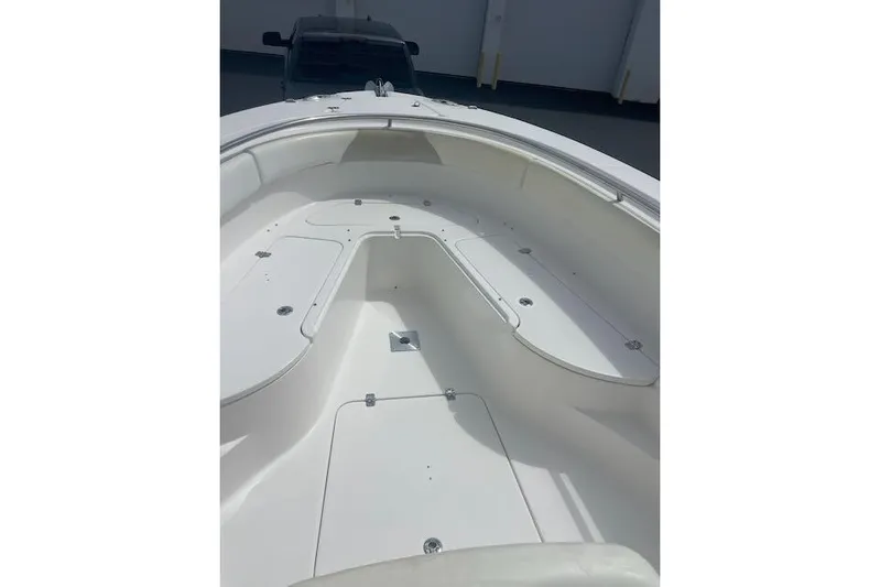 T/t Aloan At Last Yacht Photos Pics 2015 Edgewater 318CC boat interior with spacious seating and storage compartments.