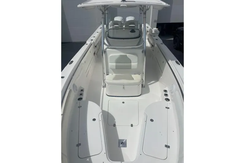 T/t Aloan At Last Yacht Photos Pics 2015 Edgewater 318CC boat interior with seating and console, showcasing spacious design.