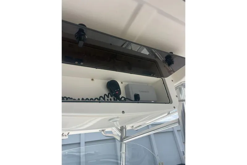 T/t Aloan At Last Yacht Photos Pics 2015 Edgewater 318CC boat console with radio and Garmin device.