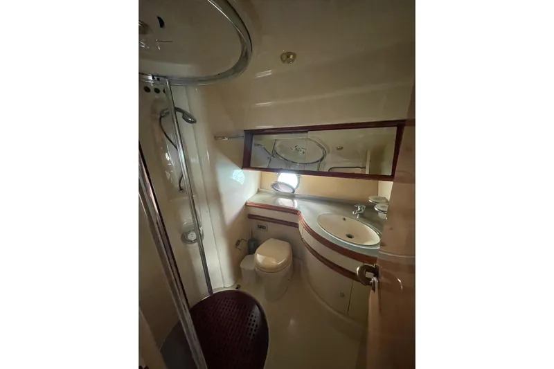  Yacht Photos Pics Luxurious bathroom in 2005 Azimut 55 Flybridge yacht with shower and sink.