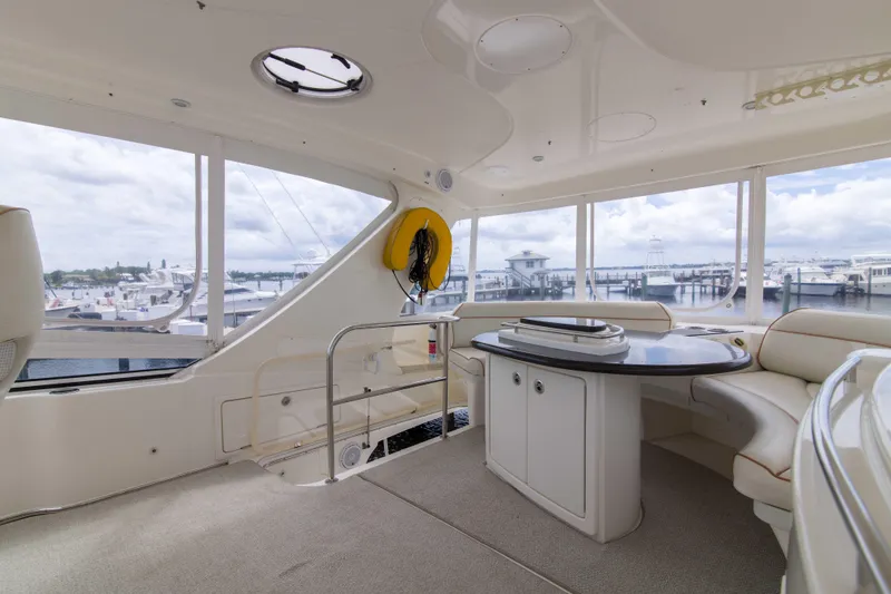 Immersed Yacht Photos Pics Luxurious interior of 2009 Silverton Oviation 52 yacht with marina view.