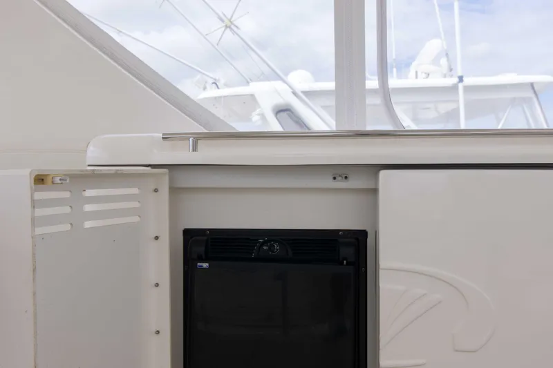 Immersed Yacht Photos Pics 2009 Silverton Oviation 52 yacht interior with built-in mini fridge.