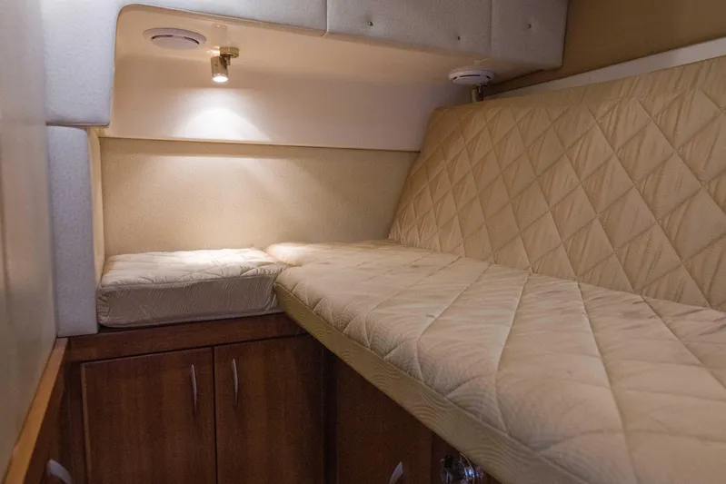 Immersed Yacht Photos Pics Interior cabin of 2009 Silverton Oviation 52 yacht with beige quilted seating.