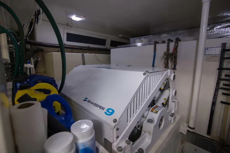 Immersed Yacht Photos Pics Engine room of 2009 Silverton Oviation 52 with Seakeeper 9 stabilizer system.