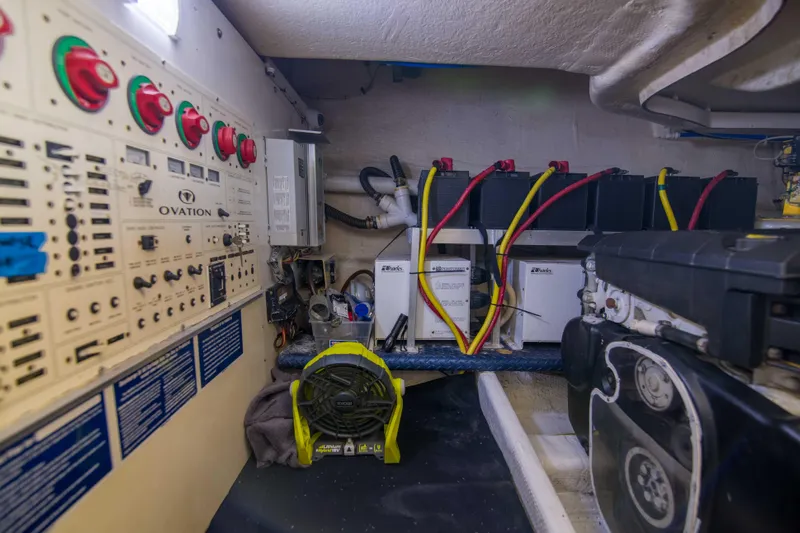 Immersed Yacht Photos Pics Engine room of 2009 Silverton Oviation 52 yacht with control panels and batteries.