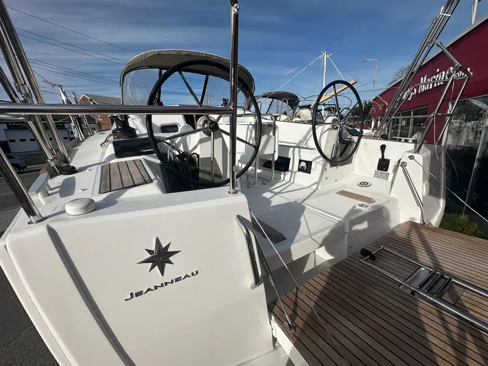  Yacht Photos Pics 2020 Jeanneau Sun Odyssey 349 sailboat with dual steering wheels and teak deck.