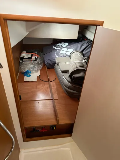  Yacht Photos Pics Interior storage space of 2020 Jeanneau Sun Odyssey 349 sailboat.