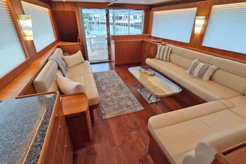 Suertudo Yacht Photos Pics Luxurious interior of 2020 Outer Reef Yachts 720 Motoryacht with elegant seating and decor.