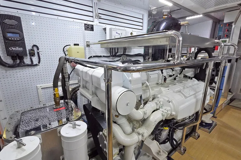Suertudo Yacht Photos Pics Engine room of 2020 Outer Reef Yachts 720 Motoryacht, showcasing advanced machinery and equipment.