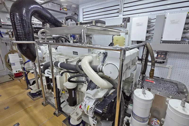 Suertudo Yacht Photos Pics Engine room of 2020 Outer Reef Yachts 720 Motoryacht, showcasing mechanical components and systems.