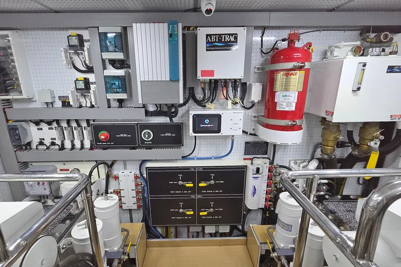 Suertudo Yacht Photos Pics Engine room of 2020 Outer Reef Yachts 720 Motoryacht with control panels and safety equipment.