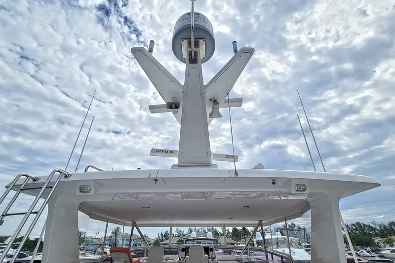 Suertudo Yacht Photos Pics 2020 Outer Reef Yachts 720 Motoryacht radar and antenna system under cloudy sky.