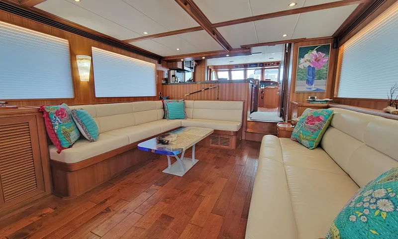 Suertudo Yacht Photos Pics Luxurious interior of 2020 Outer Reef Yachts 720 Motoryacht with elegant seating and decor.