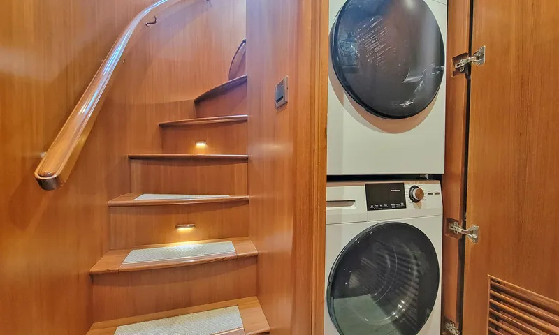 Suertudo Yacht Photos Pics Staircase and laundry area inside 2020 Outer Reef Yachts 720 Motoryacht.