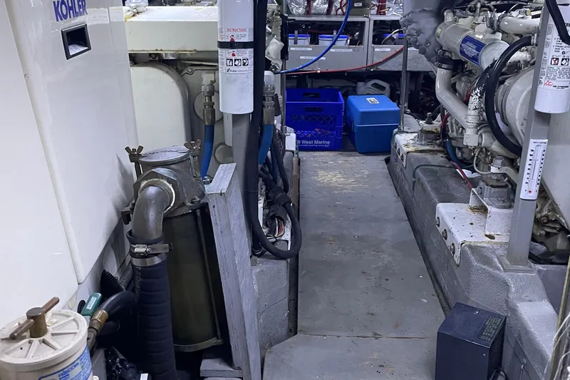  Yacht Photos Pics Engine room of 1988 Tollycraft 40 Sundeck Motor Yacht with visible machinery and equipment.