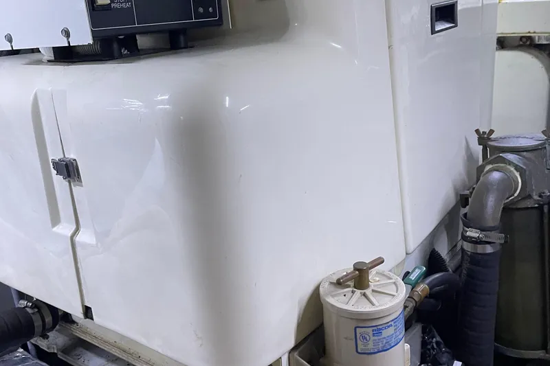  Yacht Photos Pics Engine room of 1988 Tollycraft 40 Sundeck Motor Yacht with visible machinery components.