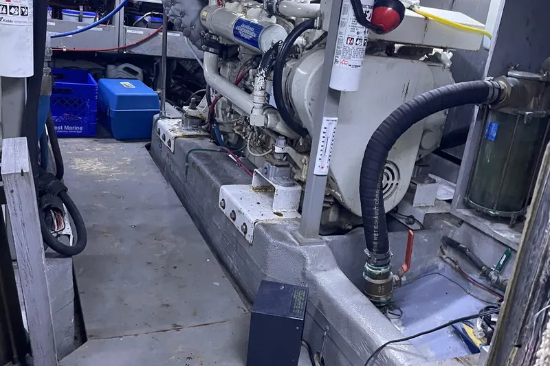  Yacht Photos Pics Engine room of 1988 Tollycraft 40 Sundeck Motor Yacht with visible machinery and equipment.