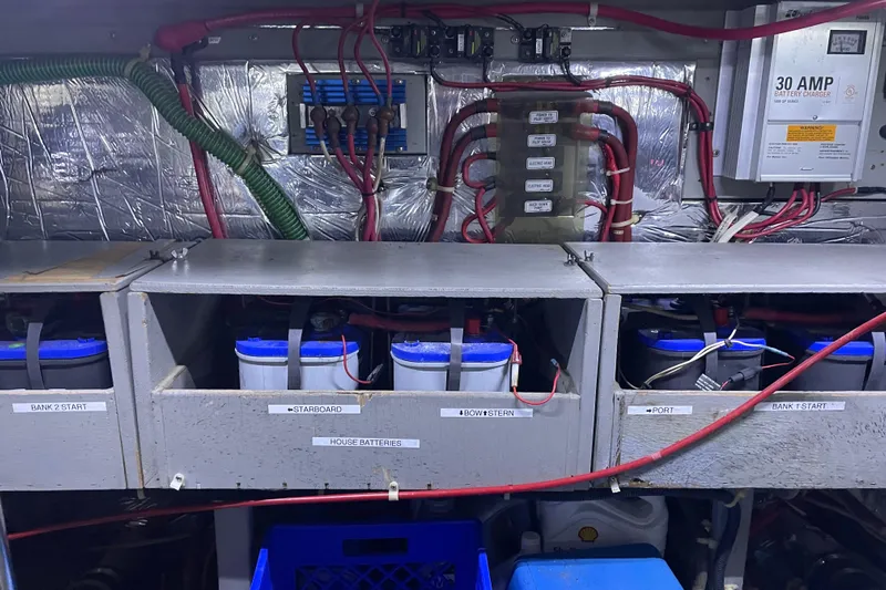  Yacht Photos Pics Battery compartment of 1988 Tollycraft 40 Sundeck Motor Yacht with labeled connections and charger.