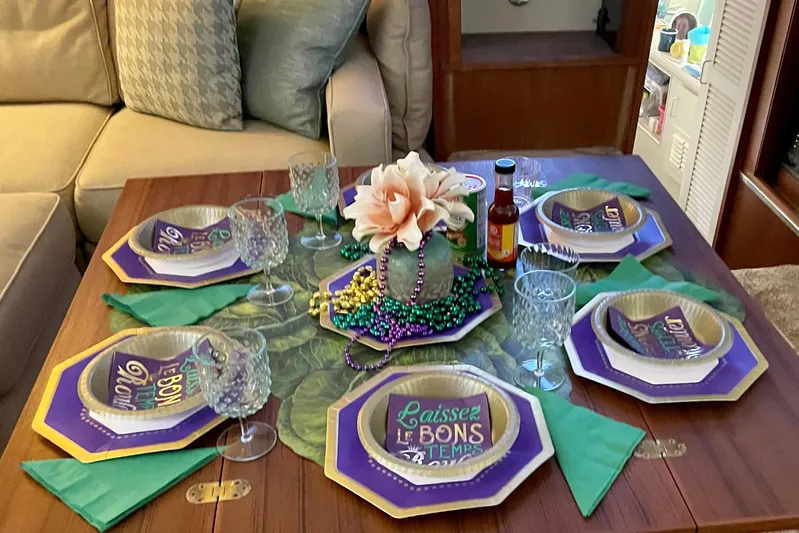  Yacht Photos Pics Festive table setting on 1988 Tollycraft 40 Sundeck Motor Yacht with Mardi Gras theme.