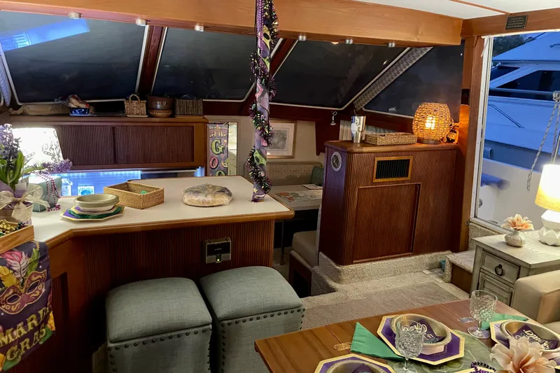  Yacht Photos Pics 1988 Tollycraft 40 Sundeck Motor Yacht interior with festive Mardi Gras decor.