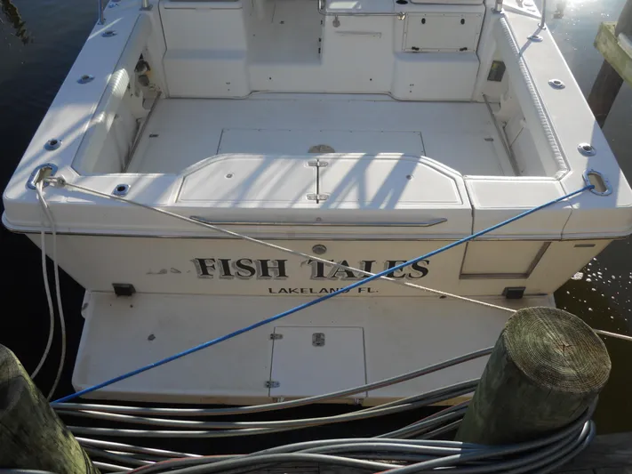 Fish Tales Yacht Photos Pics Boston Whaler 34 Defiance 2000 boat named "Fish Tales" docked in Lakeland, FL.