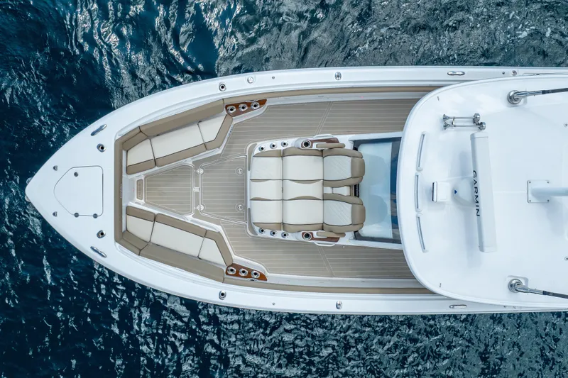 Golden Hour Yacht Photos Pics Overhead view of 2021 Everglades 395 Center Console boat on water.