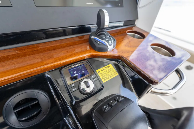 Golden Hour Yacht Photos Pics Control panel of 2021 Everglades 395 Center Console boat with advanced navigation features.