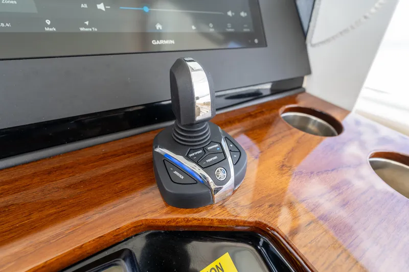 Golden Hour Yacht Photos Pics Joystick control on 2021 Everglades 395 Center Console boat dashboard.